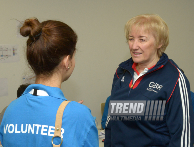 Делегации различных стран проходят аккредитацию на Кубок мира по прыжкам на батуте в Баку. Азербайджан, 3 март, 2016 